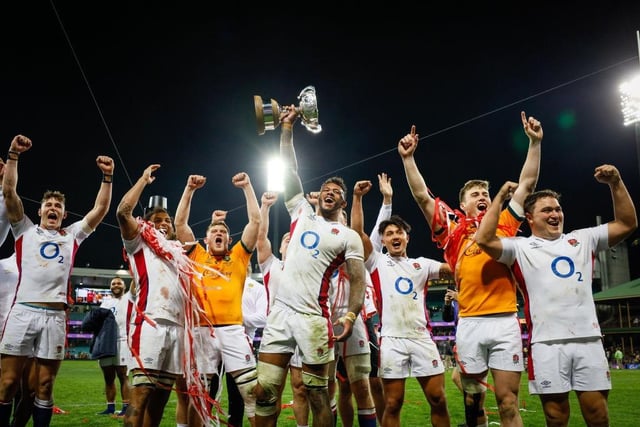 Courtney Lawes and his England team-mates celebrate