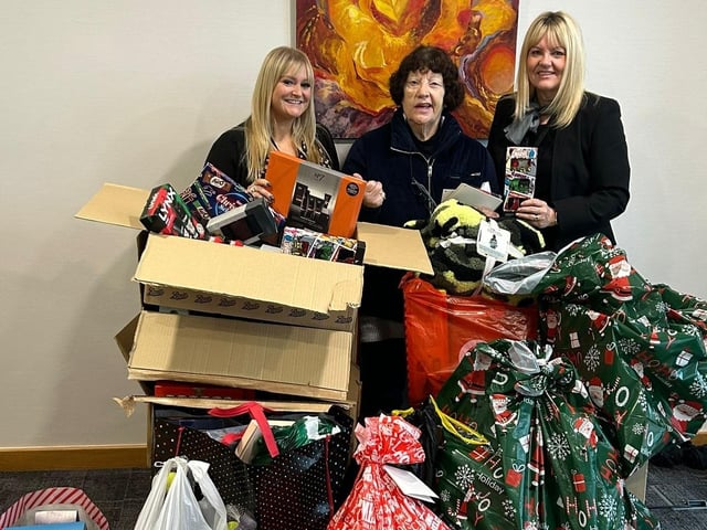 Shoosmiths staff with Mother Christmas