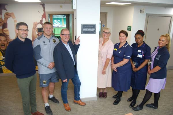 The plaque pictured with representatives from Northampton General Hospital’s Community Midwifery Tea