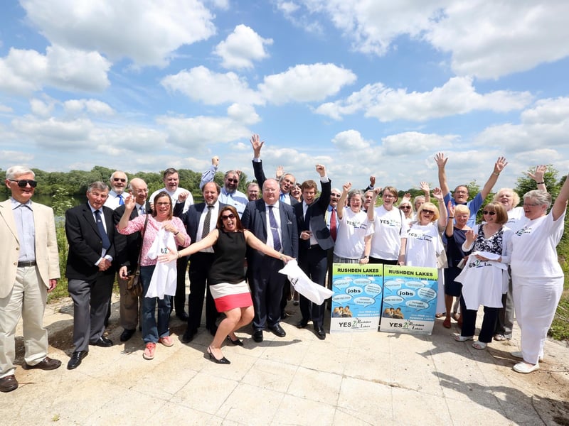 Eric Pickles, then Secretary of State for Communities and Local Government, visits the site with MP Peter Bone and the supporters of the Yes campaign when the scheme was finally approved in June 2014