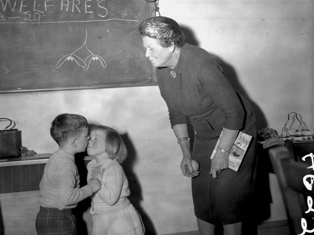 Looking back old glass negs two toddlers kiss