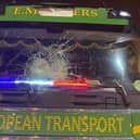 The firm says the lorry was attacked by migrants in Calais