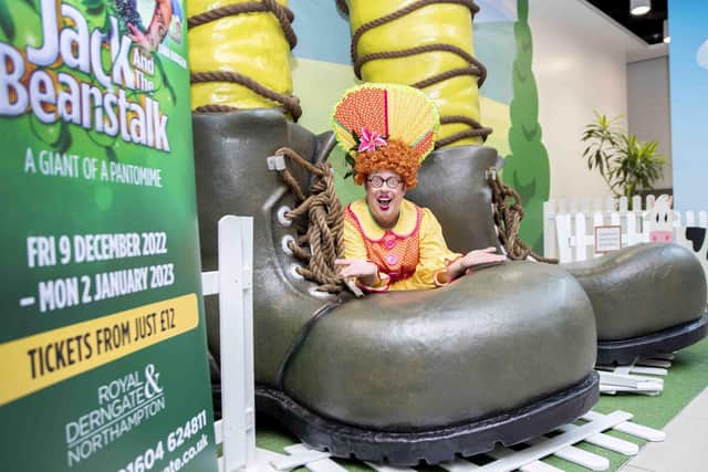 Bob Golding as Dame Trot was on hand to unveil the giant boots at Grosvenor Shopping Centre in Northampton. Photo: Kirsty Edmonds.