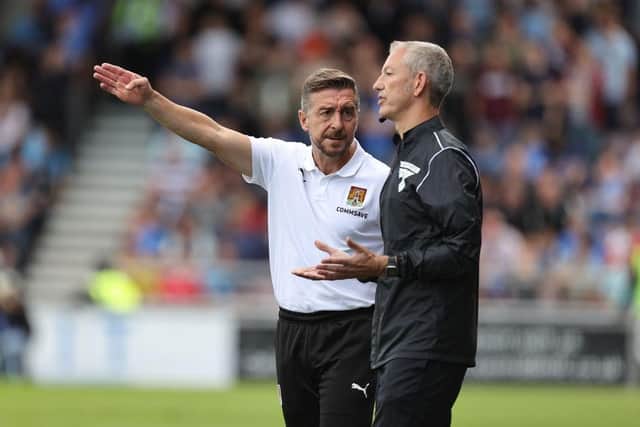 Cobblers boss Jon Brady makes his point to fourth official Dean Treleaven during the Sky Bet League One match between Northampton Town and Wycombe Wanderers at Sixfields on September 02, 2023 in Northampton, England. (Photo by Pete Norton/Getty Images)