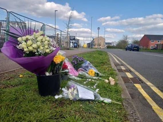 More tributes have been laid next to where the young man was killed in New South Bridge Road on Sunday night (April 23)
