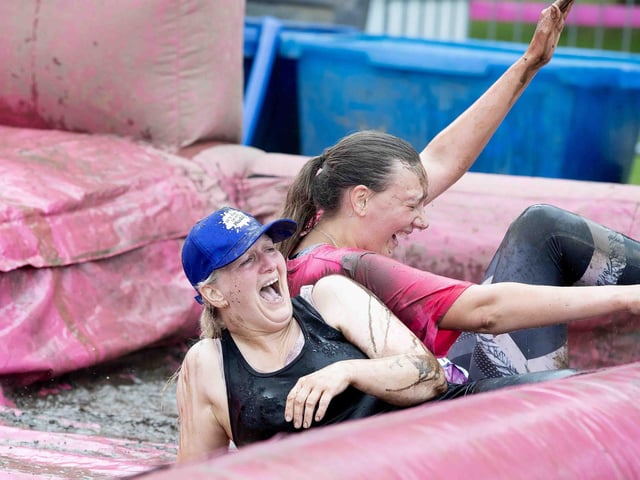 All smiles as participants tackled obstacles during Race for Life's Pretty Muddy on Saturday July 13, 2024 in Abington Park.