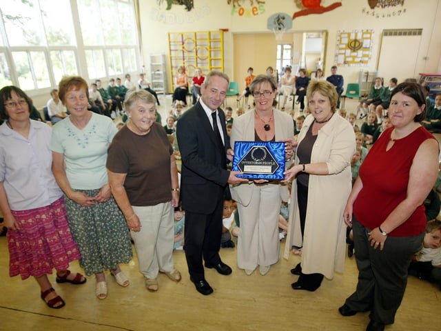 2007: St Lukes Primary school being presented Investors in People award. Names l-r: Dorothy Aslett, Val Thomas, Gwneth Pratt, David Allan (presenting the award), Julie Rowley, Sue Edmonds (head teacher), Clare Mitchill.