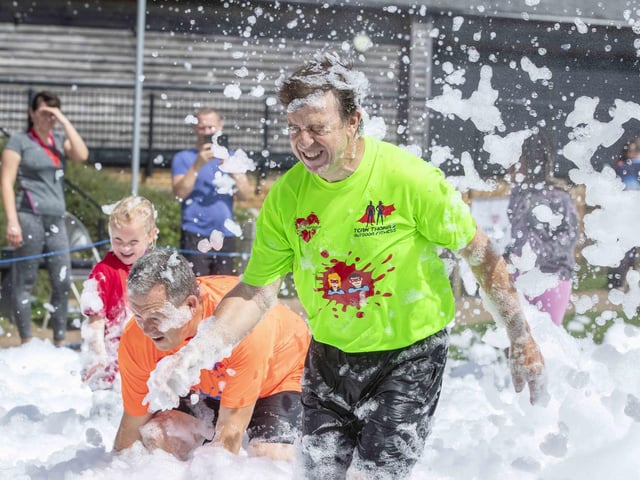 A family-friendly fun run, with water slides and obstacles, took place at Upton Country Park on Saturday (August 12) to raise funds for a Northampton charity.
