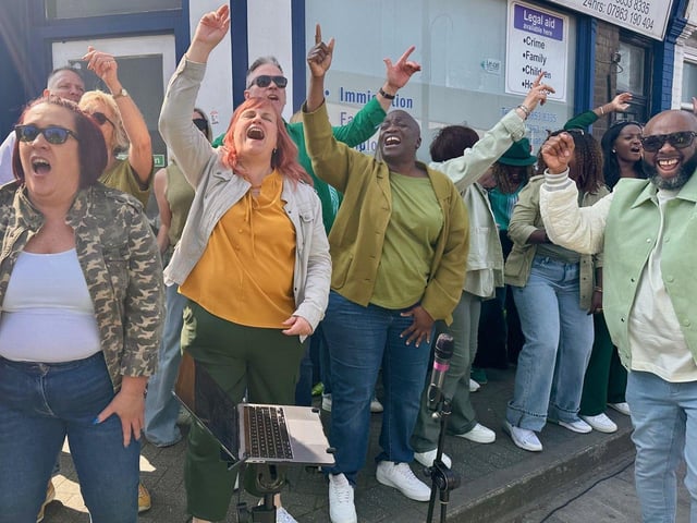 Northants Sings Out support children's charity, Barnardo's, at the London Marathon by spurring on runners with their uplifting performances