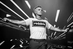 Robbie Williams will head to Silverstone next year.
