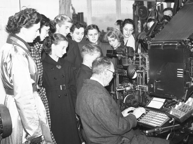 Tour party looks at Chron Linotype operator