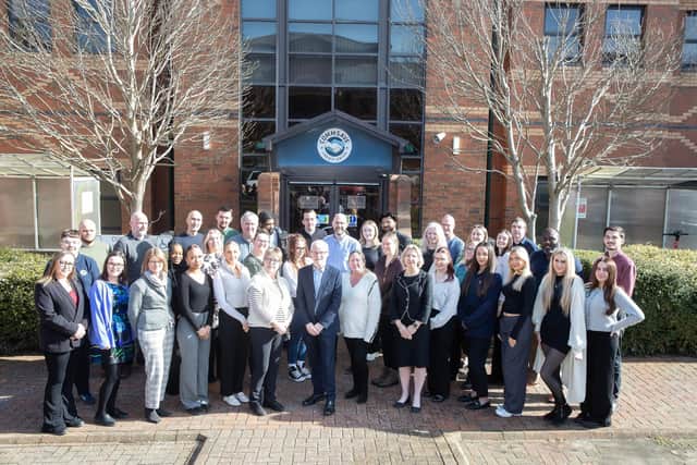 Commsave team celebrate record breaking membership
