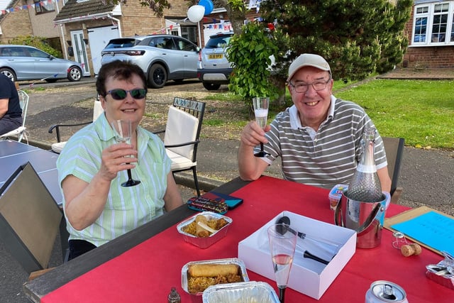 Linda and Philip Odell celebrate in style at the Barnard Close street party in Northampton on Sunday, May 7 2023.
