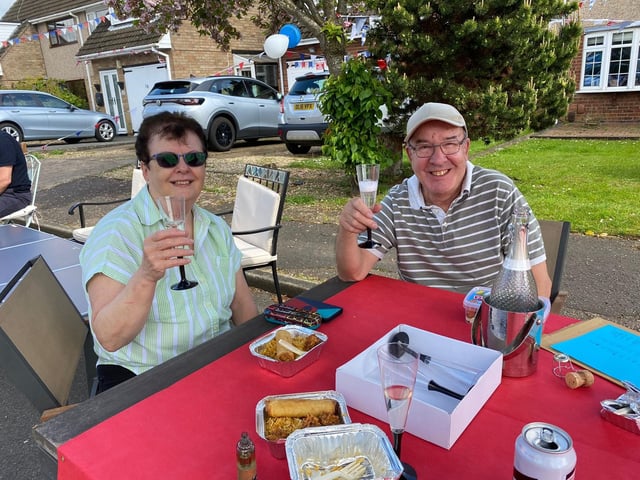 Linda and Philip Odell celebrate in style at the Barnard Close street party in Northampton on Sunday, May 7 2023.