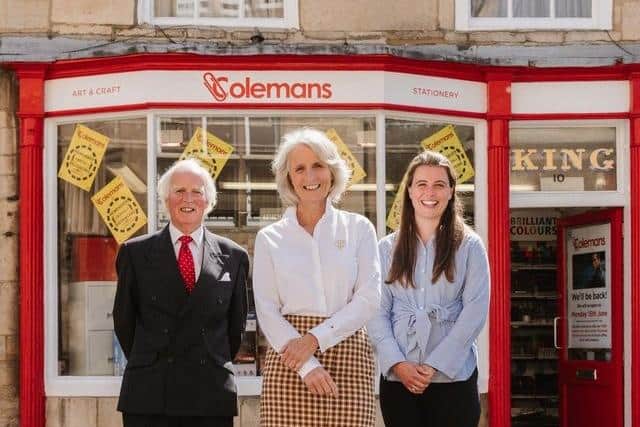 Three generations of the Coleman family - John, Joey and Tallie - outside the Oundle shop in 2020