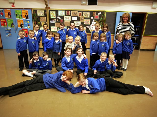 Briar Hill Primary - 11 sets of twins and a set of triplets, the headteacher, Cath Keohane is also a twin herself. Names: Front: Robert and Hannah Cartwright Year 6, Row Sitting Down l-r: Beth and Katy Chambers Year 5,Jessica and Rachel Sayles-Scott Year 5, Scott and Jake Foster Year 3. Third Row Back l-r: Luke and Lewis Hamilton Year 1,Hollie and Chloe Millard-Calf Year 1, Jack and Tia Whitehead Nursery, Makala and Kimberley Harvey Year 1,Esmerelda and Jessica Murtaka Reception class. Back Row: Aaron and Tamara Tonsley Year 5, Triplets Leigh, Kirsty and Alex Glasgow Year 5, Saffire and Paris Chiltern year 5. Plus headtteacher Cath Keohane.