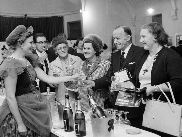 An evening of wine tasting at Corstorphine Public Hall, in Kirk Loan, in October 1964.