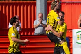 Morgan Roberts celebrates scoring Brackley's equaliser in their 1-1 draw at Tamworth on Monday (Picture: Pete Keen)