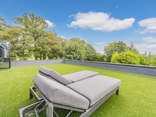 The first floor bedrooms lead out to a luxury terrace, ideal for sunbathing, with picturesque views of the countryside beyond