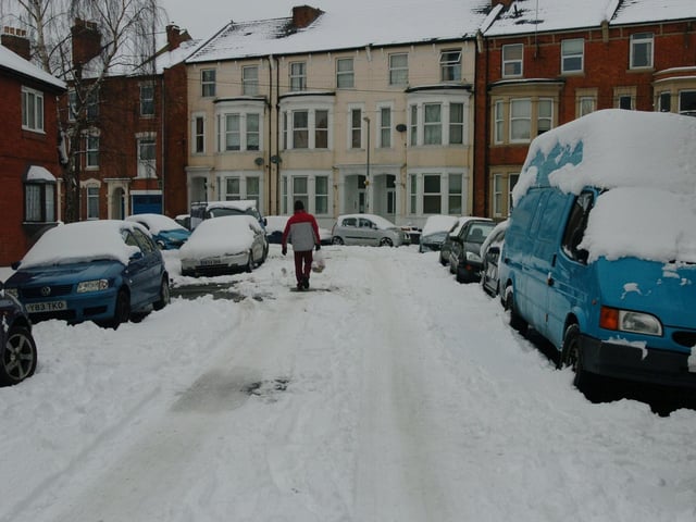 One resident takes to walking on the road rather than the thick snow. Thursday, 5th February 2009