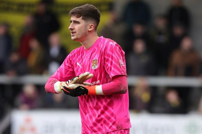 Impressively mature performance for someone so inexperienced. Stood up to crosses, corners and long throws and made saves when required, the best of which came from Sweeney's near post header. His first professional clean sheet and he deserved it.... 7.5
