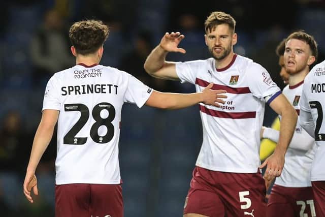 Marshalled the defence excellently as Cobblers kept their discipline and held Oxford at arm's length for the most part. Other than a late mix-up that let Goodrham in, and outside of the two goals, the hosts had very few clear sights of Town's goal... 7.5 CHRON STAR MAN