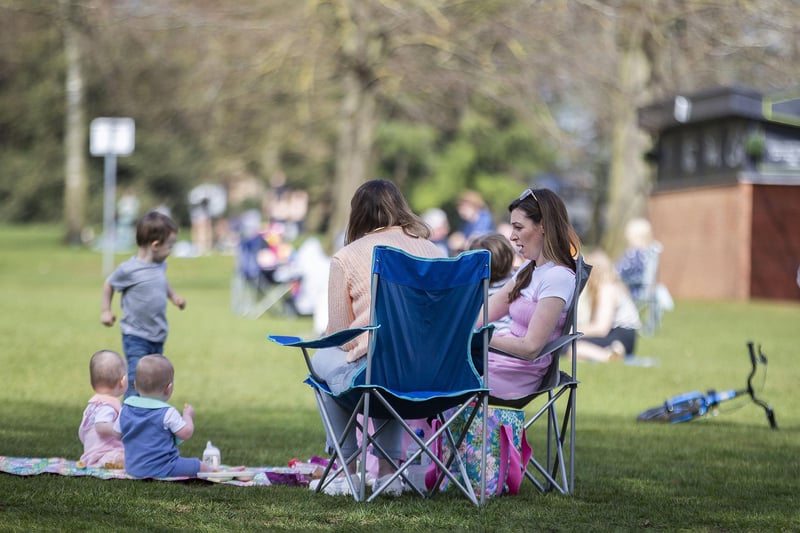 Locals enjoy the sunshine in Abington Park.