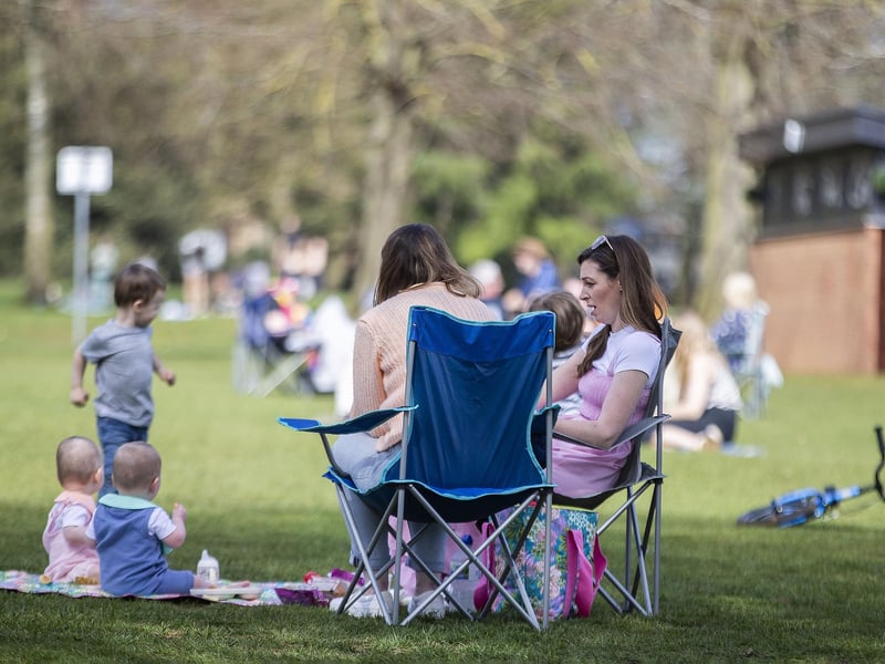 Locals enjoy the sunshine in Abington Park.