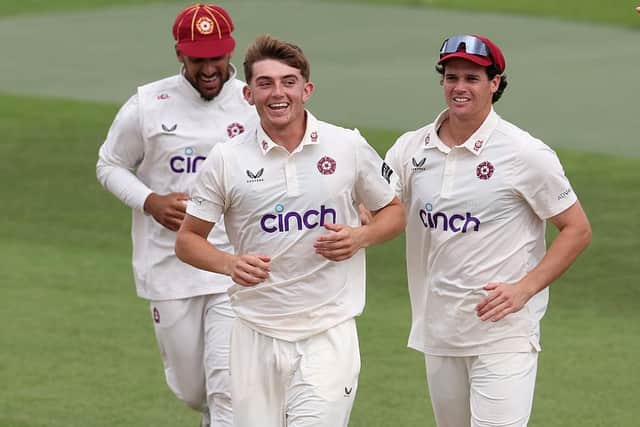 James Sales celebrates with his Northants team-mates after taking the wicket of Chris Benjamin (Photo by David Rogers/Getty Images)