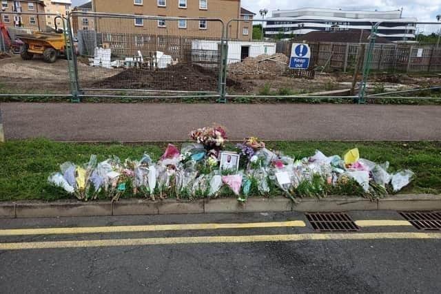 Floral tributes lay where Kwabena died in New South Bridge Road