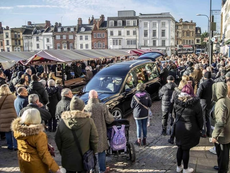 Hundreds gathered in the Market Square on December 7 to pay their respects to town legend and veteran market trader, Eamonn 'Fitzy' Fitzpatrick. Fitzy's final farewell took place on a beautiful sunny morning at the market stall where he had been selling fruit and veg from for 60 years. His coffin, which had his famous yellow cap sat proudly on top of it, was driven past his stall and through the market for the final time.