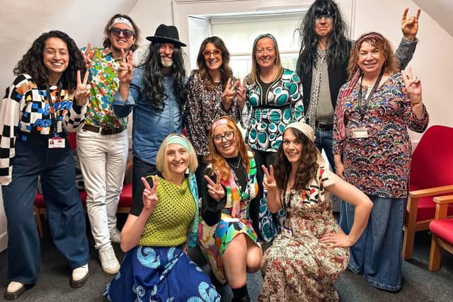 Staff embraced the fundraiser by dressing in 1970s-inspired outfits