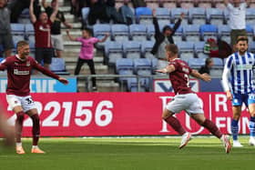 Sam Hoskins celebrates firing the Cobblers into the lead at Wigan in August, but the home side hit back to win 2-1 (Picture: Pete Norton/Getty Images)