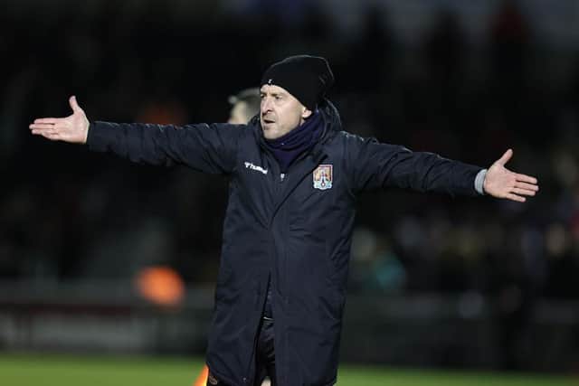 Jon Brady shows his frustration during the Cobblers' 2-1 defeat to Swindon on Tuesday (Picture: Pete Norton)