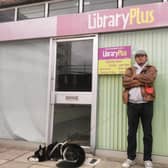 Dave Dillow, with his dog Bella, standing outside the former library in St James Road he wants to rent from West Northants Council.