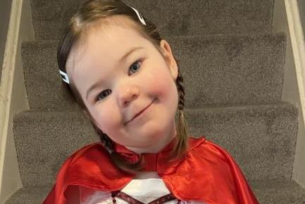 Ayla, aged two, as Little Red Riding Hood.