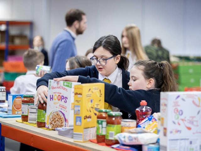 70 bags of food were packed by the 11 hardworking students, who learnt the importance of showing kindness and empathy to the community.