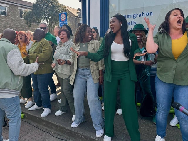 Northants Sings Out perform for runners at the Barnardo's cheer station at the London Marathon