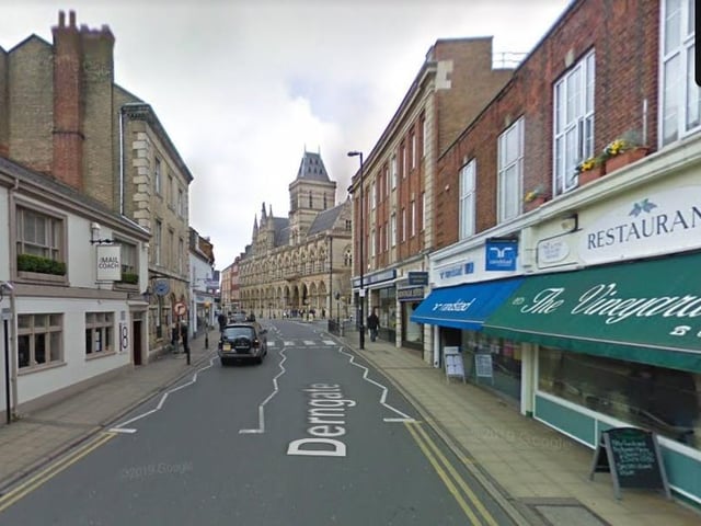 Derngate looking towards The Guildhall. The Mailcoach (left) is still open today, the former Vineyard restaurant (right) has recently reopened as an Italian eatery called Pala, and the iconic Montague Jeffery (top right) continues to thrive.