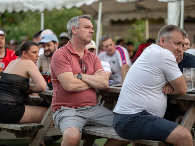 Fans watching England’s 0-0 draw with Ghana in the garden of The Black Prince in Northampton on Tuesday, June 23, 2026. Photo by David Jackson.