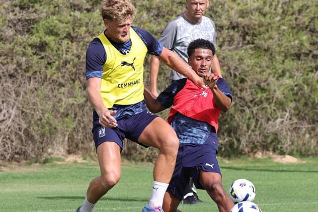 Cameron McGeehan and Matty Ireland get to grips with each other