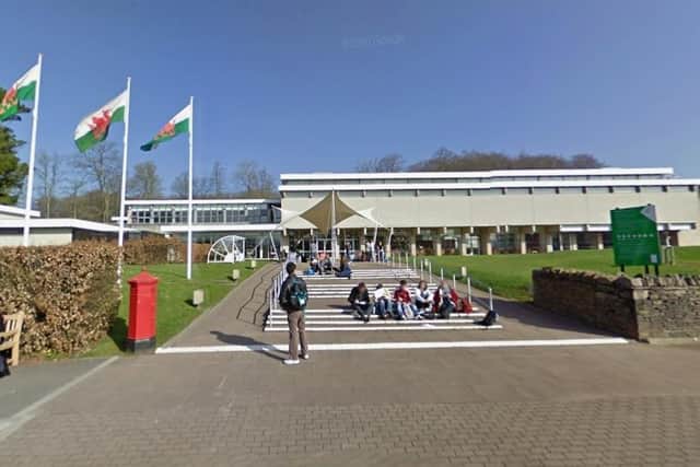 Two Northampton men have been arrested after items were stolen from St Fagans National Museum of History in Cardiff.