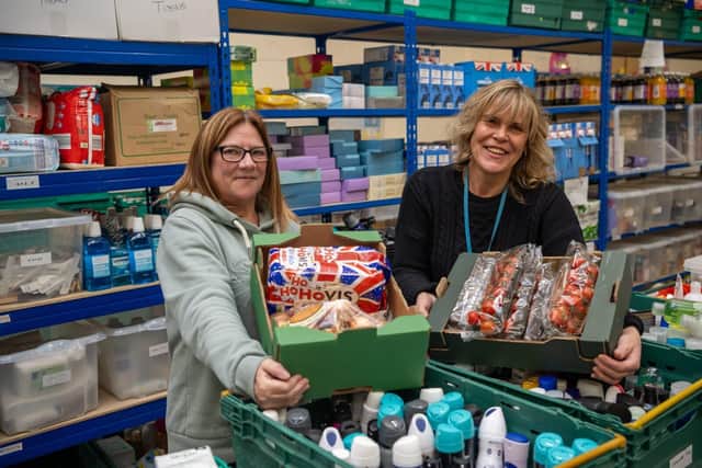 DWSM - SGB-27677 - Staff from the Daylight Centre Fellowship inside their Wellingborough foodbank