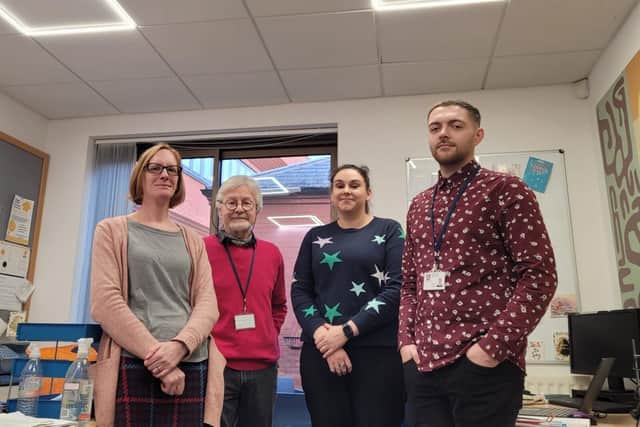 From left to right: Voluntary Impact's Becky Thornton, with Cllr Andrew Stevens and staff members