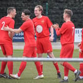 ON Chenecks Reserves celebrate a goal in their 4-1 UCL win over Milton Keynes Irish Reserves on Saturday (Picture: Richard Eason)