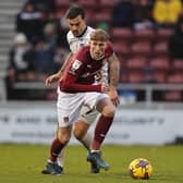 Mitch Pinnock looks to start an attack for the Cobblers in their clash with Portsmouth at Sixfields (Picture: Pete Norton)