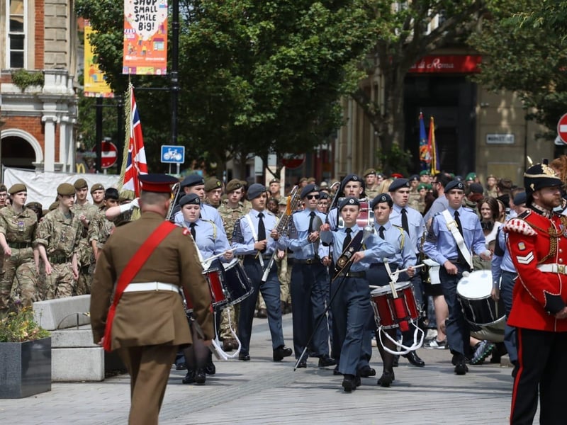 Kettering town centre: crowds line town centre to welcome The Royal Anglian Regiment for Armed Forces Day parade /National World