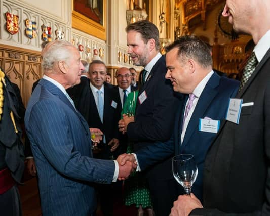 Barry shaking hands with His Majesty The King.