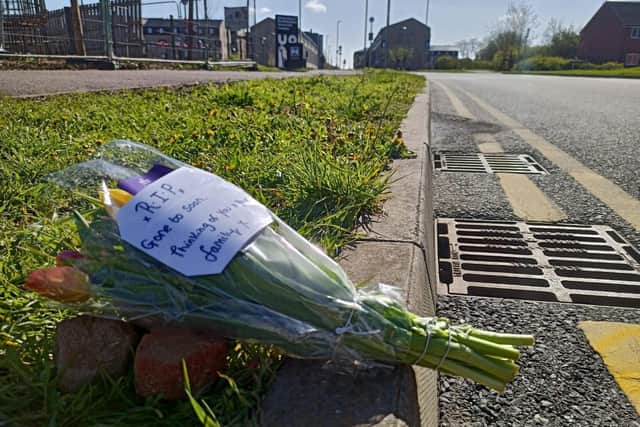 Flowers left in tribute.