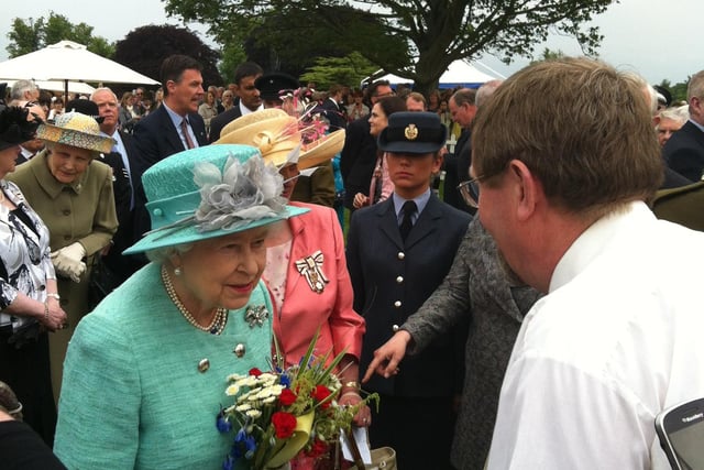 The Queen meeting Chris Saul in Spratton in 2012. Chris showed Her Majesty his 'Diamond Pie'.